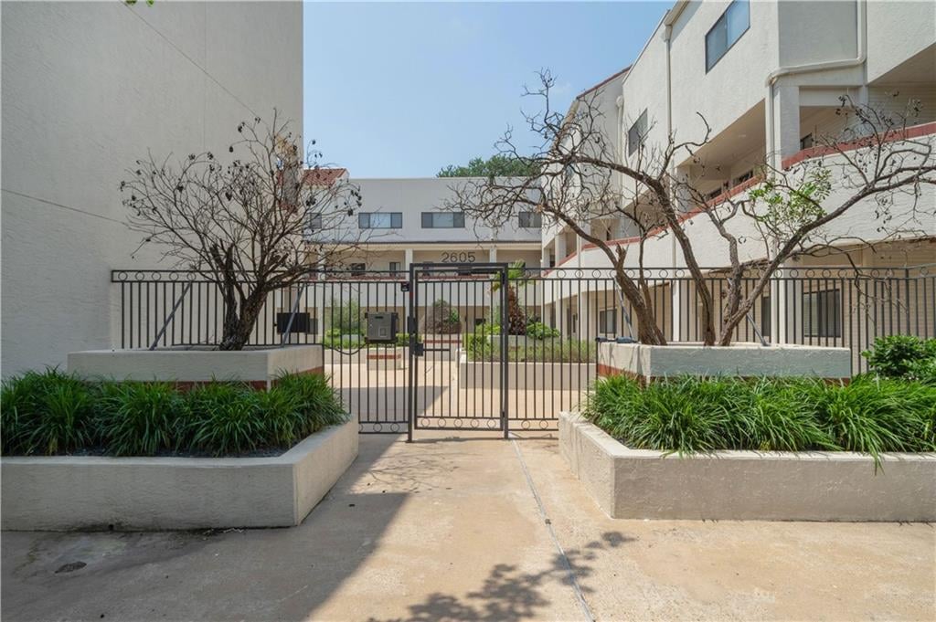 View 2605 Enfield RD Unit #110 in Enfield Townhomes 2605 Enfield RD Unit #110 - front exterior - Luxury home in Enfield Townhomes, Austin, TX