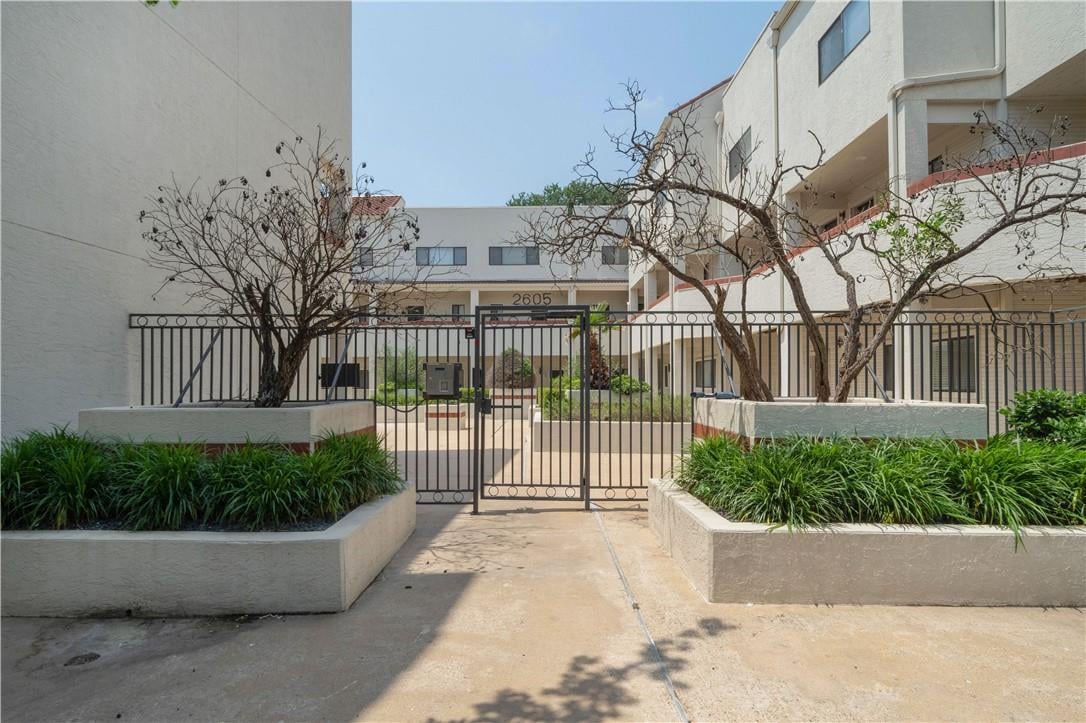 View 2605 Enfield RD Unit #110 in Enfield Townhomes 2605 Enfield RD Unit #110 - front exterior - Luxury home in Enfield Townhomes, Austin, TX