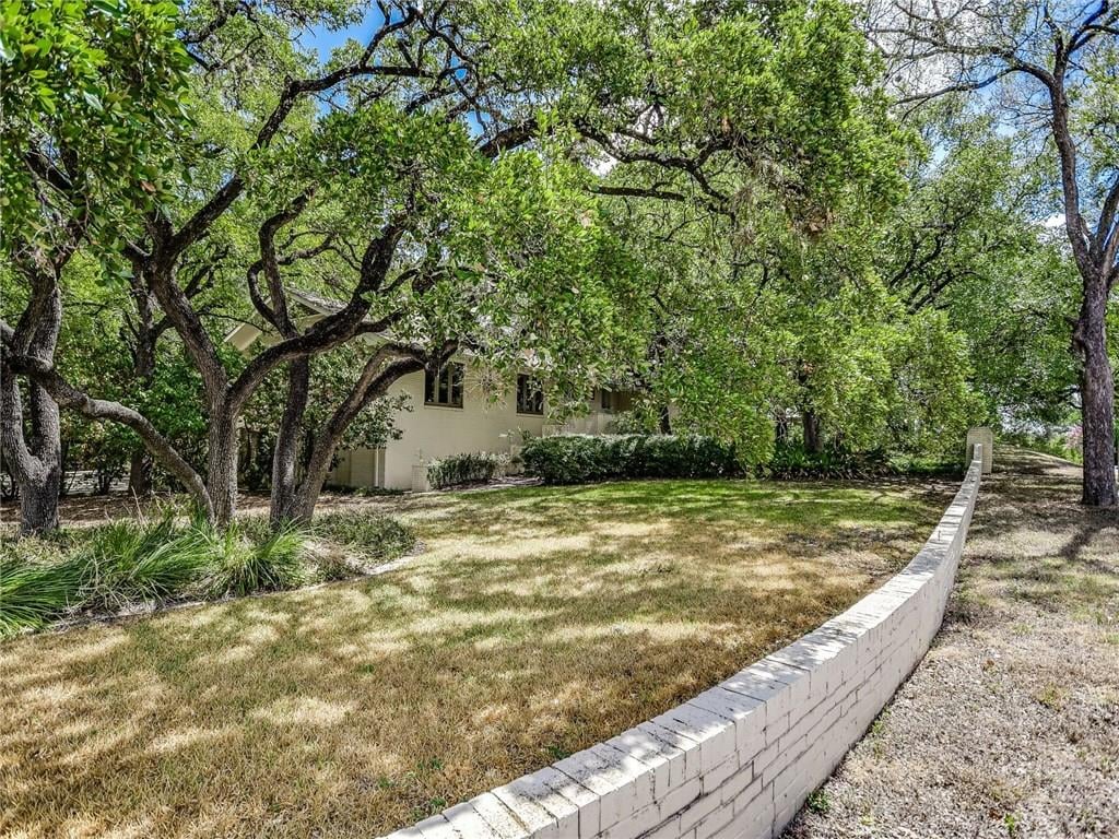 View 2605 Rollingwood DR in Dge Add 2605 Rollingwood DR - front exterior - Luxury home in Dge Add, Austin, TX