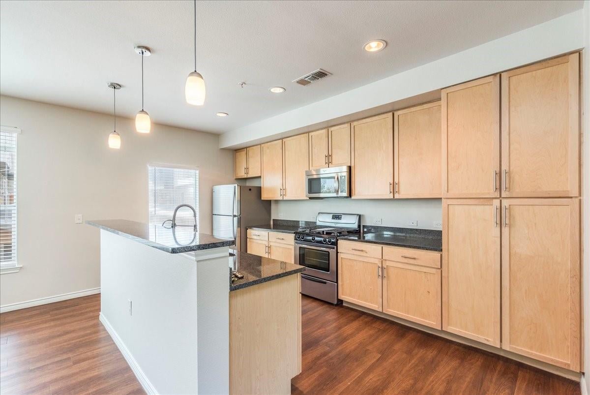 View 2606 Wilson ST Unit #1502 in Flats On Wilson Condo A 2606 Wilson ST Unit #1502 - property photo 1 - Luxury home in Flats On Wilson Condo A, Austin, TX