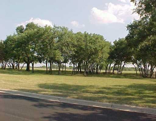 View 26101 Masters Py 26101 Masters Py - front exterior - Luxury lot in Spicewood, TX