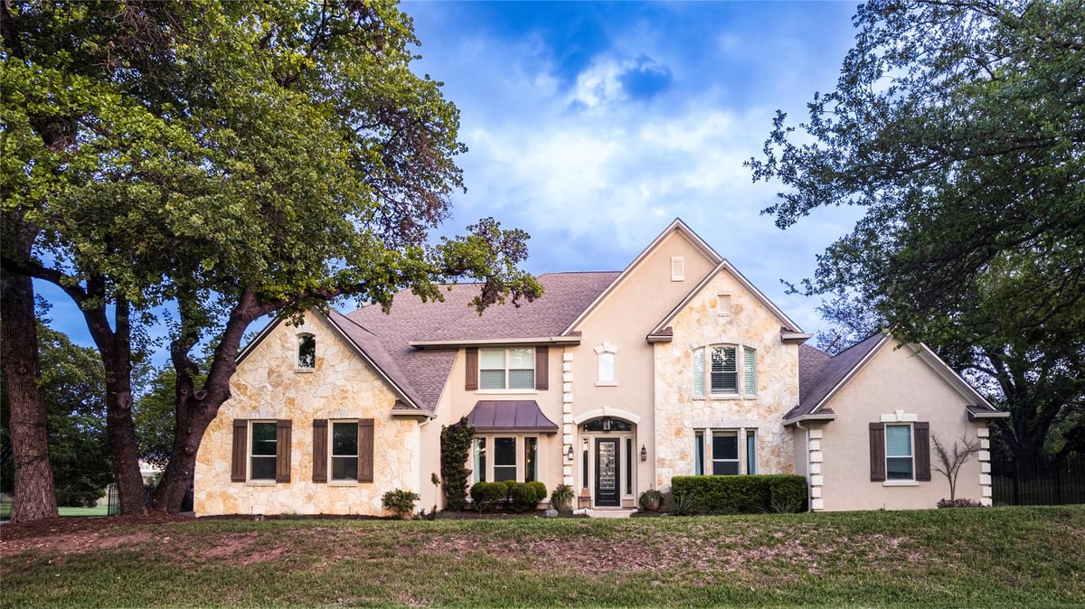 View 2611 Demona Dr in Werkenthin Sec 03 2611 Demona Dr - front exterior with traditional brick facade - Luxury home in Werkenthin Sec 03, Austin, TX