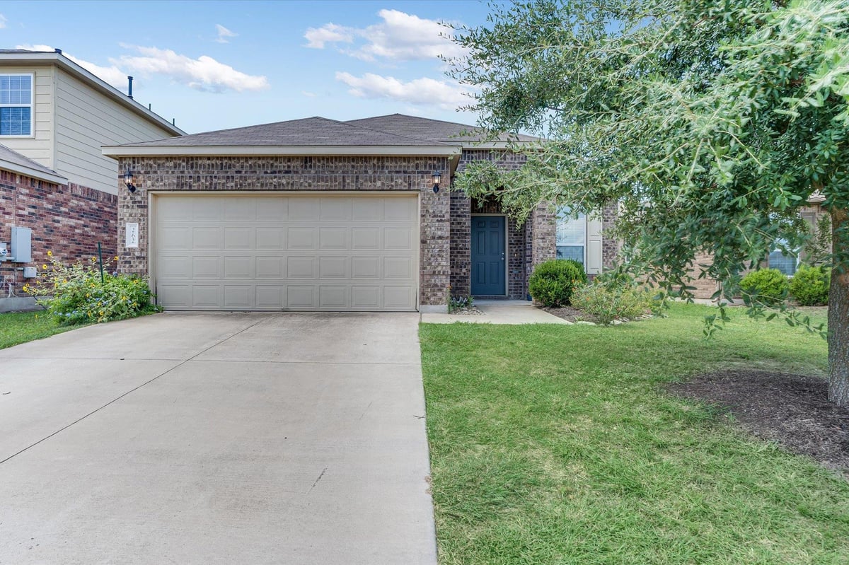 View 262 Martha Dr in Sunfield Ph Two Sec Six 262 Martha Dr - property photo 1 - Luxury home in Sunfield Ph Two Sec Six, Buda, TX