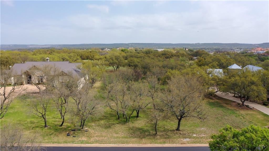 View 26204 Masters Pkwy in Barton Creek Lakeside 26204 Masters Pkwy - front exterior - Luxury lot in Barton Creek Lakeside, Spicewood, TX