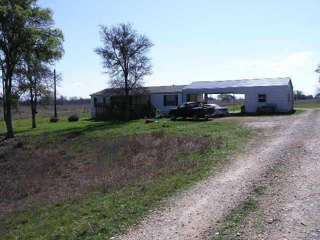 View 2635 Callihan RD 2635 Callihan RD - front exterior - Luxury home in Luling, TX