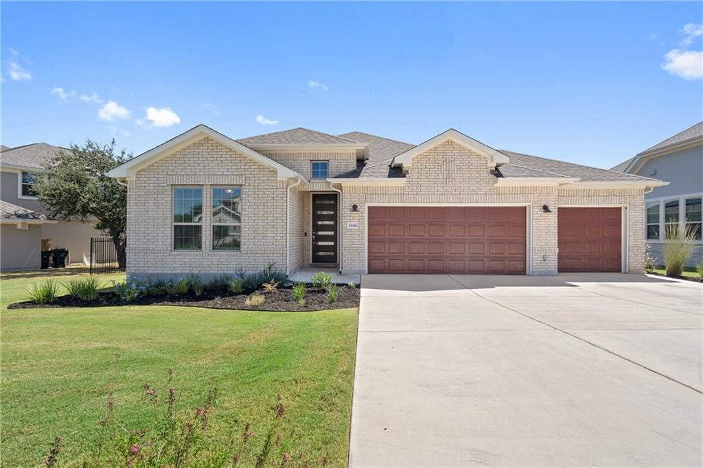 View 2656 Reunion Blvd in Reunion Ranch Ph Three Sec Two 2656 Reunion Blvd - front exterior - Luxury home in Reunion Ranch Ph Three Sec Two, Austin, TX