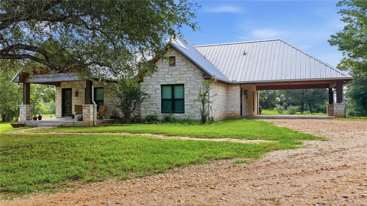 View 2656 River Bend RD in None 2656 River Bend RD - front exterior - Luxury home in None, Smithville, TX