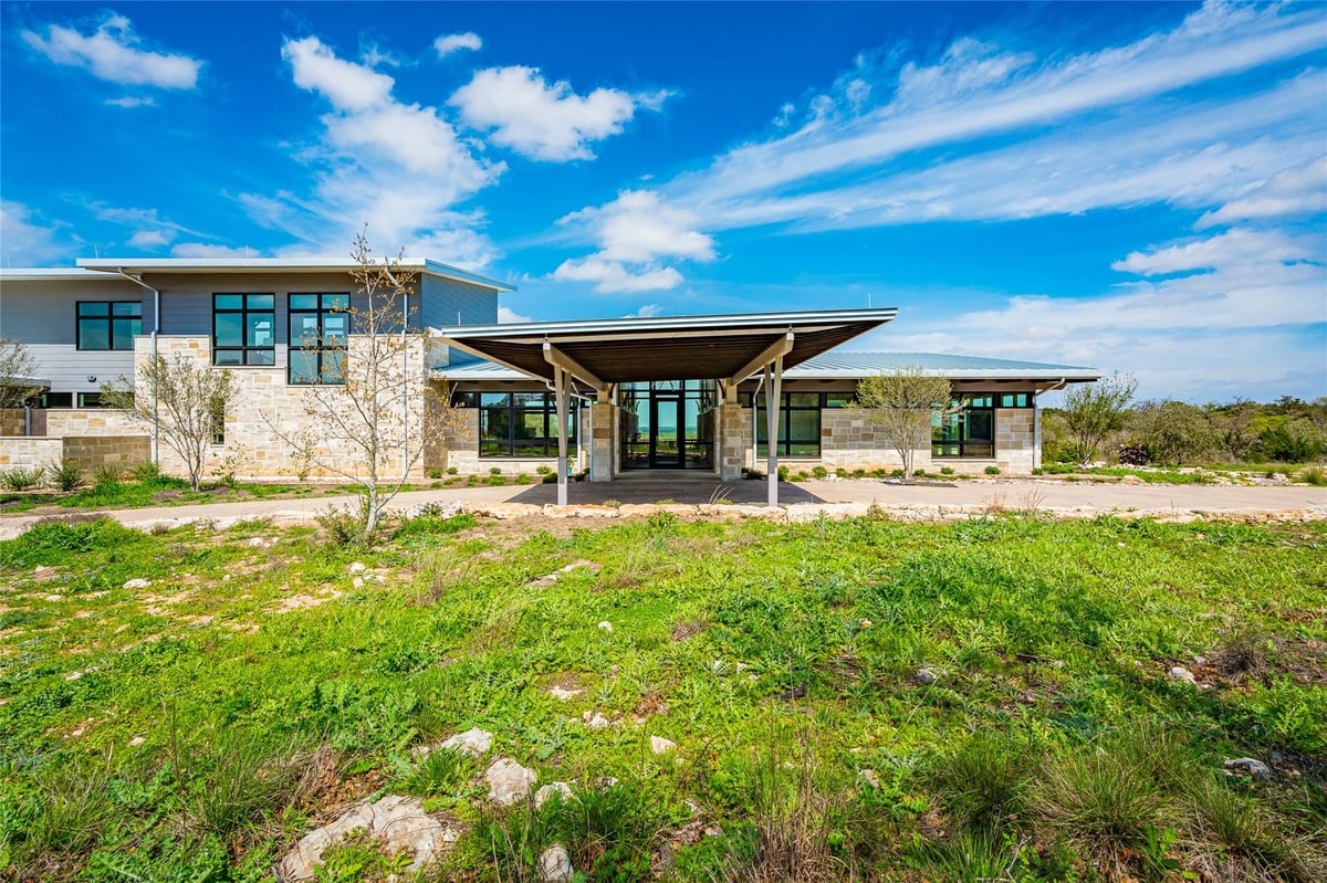 View 2660 Elder Hill RD in Tres Arroyos 2660 Elder Hill RD - front exterior - Luxury home in Tres Arroyos, Driftwood, TX