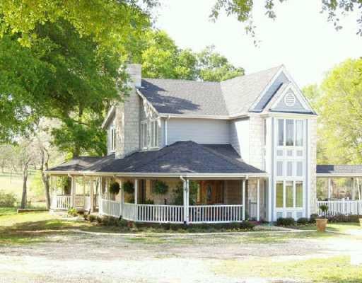 View 2675 FM 696 2675 FM 696 - front exterior - Luxury home in Lexington, TX