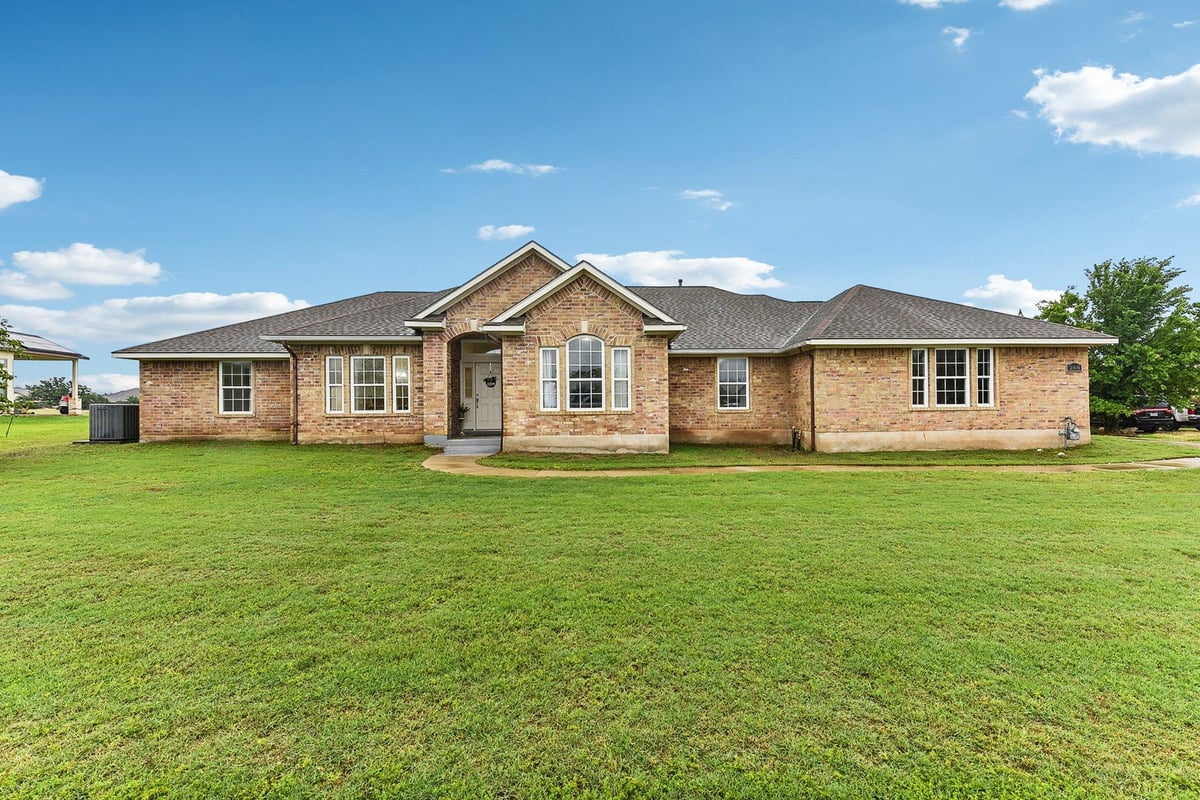 View 268 Chisholm TRL in The Colony Mud 268 Chisholm TRL - front exterior - Luxury home in The Colony Mud, Bastrop, TX