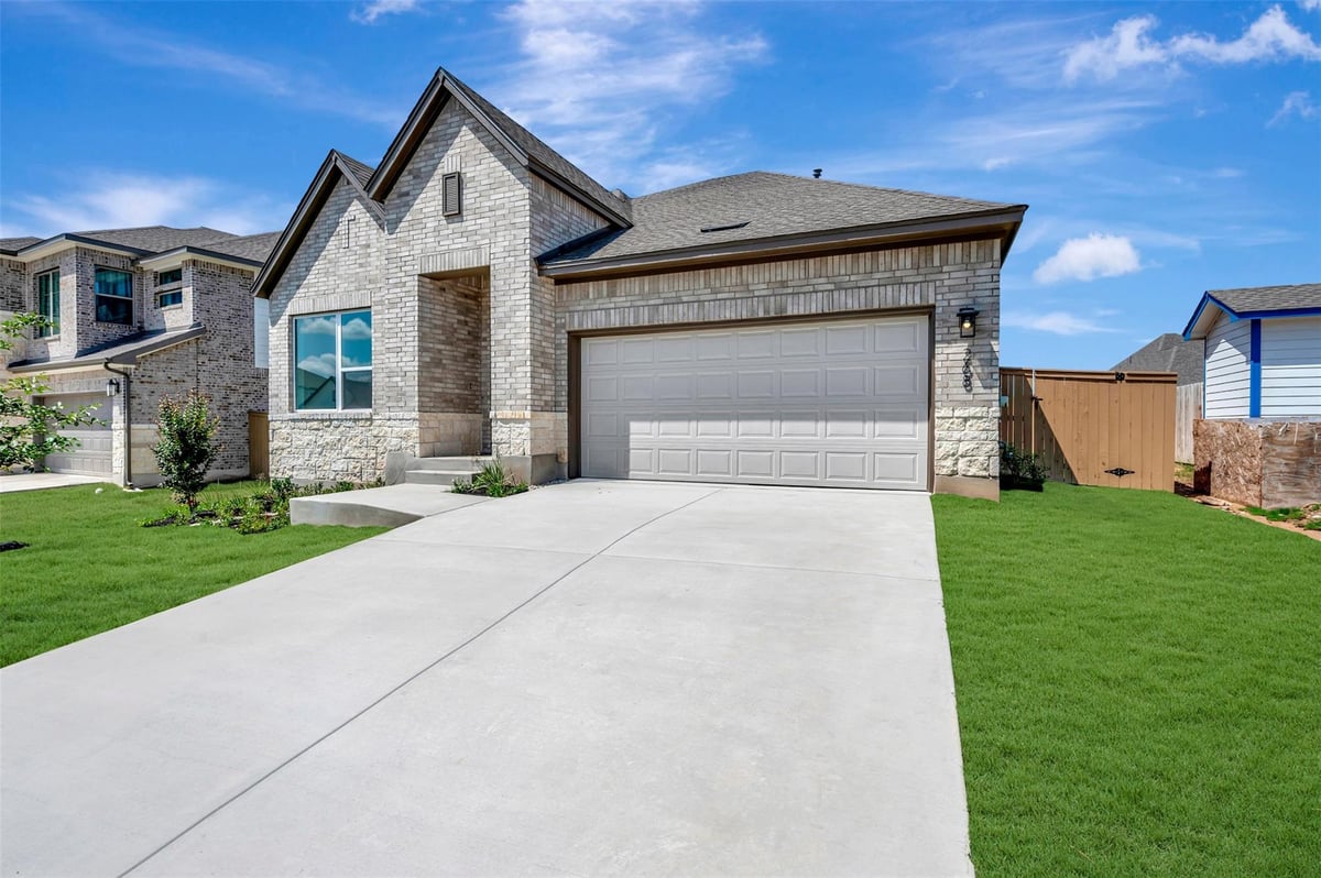 View 268 Coleto TRL in The Colony - Coleton Meadow 268 Coleto TRL - front exterior - Luxury home in The Colony - Coleton Meadow, Bastrop, TX