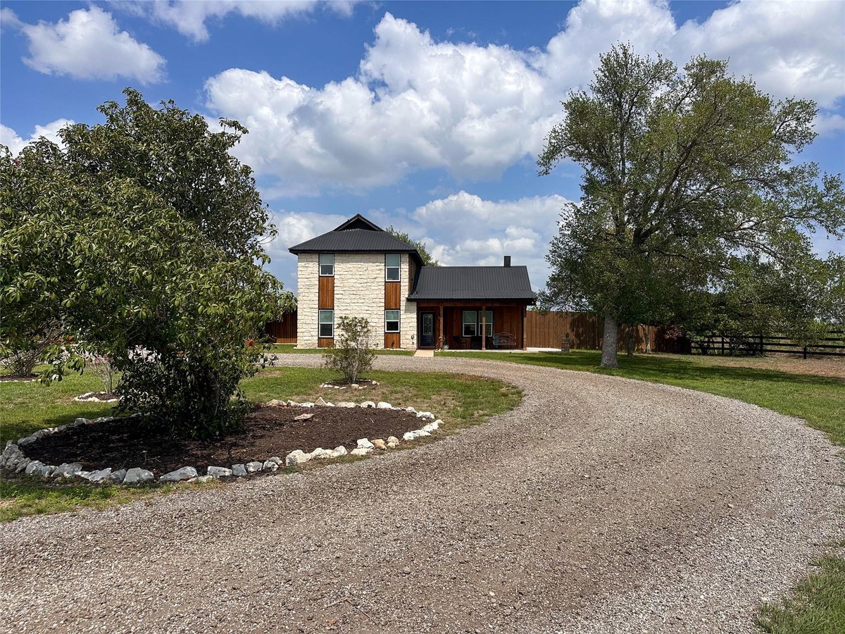 View 2687 Cotton Gin Rd in A0014 JOHN STEWART SURVEY, ACRES 1.9772 2687 Cotton Gin Rd - front exterior - Luxury home in A0014 JOHN STEWART SURVEY, ACRES 1.9772, Kyle, TX