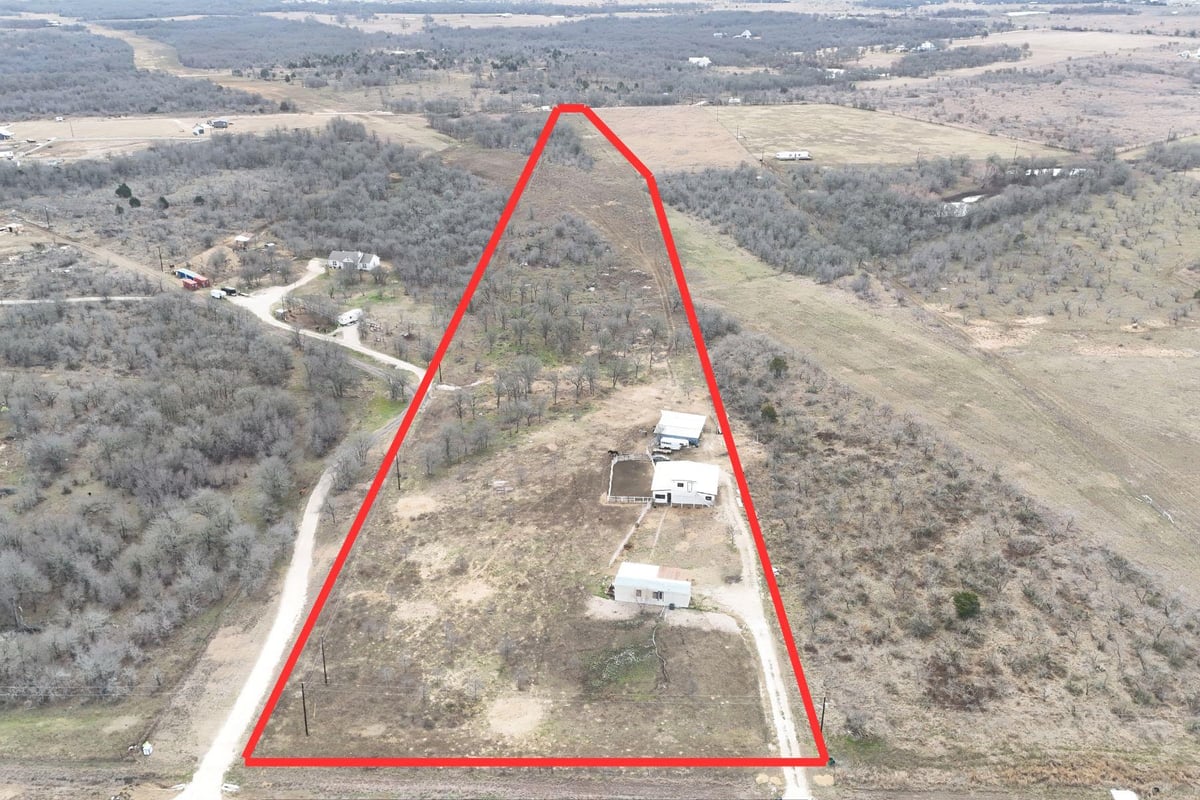 View 2690 County Road 466 in Graves 2690 County Road 466 - front exterior - Luxury lot in Graves, Elgin, TX