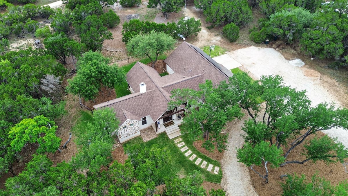 View 270 Rambling Oaks Dr in River Oaks Of Wimberley Unit 4 270 Rambling Oaks Dr - front exterior - Luxury home in River Oaks Of Wimberley Unit 4, Wimberley, TX