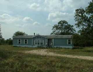 View 2702 Silver Mine RD 2702 Silver Mine RD - front exterior - Luxury home in Tilmon, TX