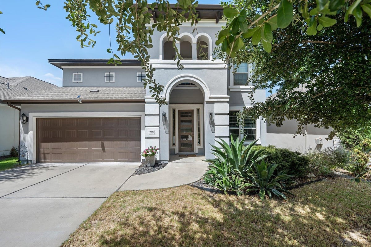 View 2709 Villa Capri CT in Travisso Ph 2 Sec 1M 2709 Villa Capri CT - front exterior - Luxury home in Travisso Ph 2 Sec 1M, Leander, TX