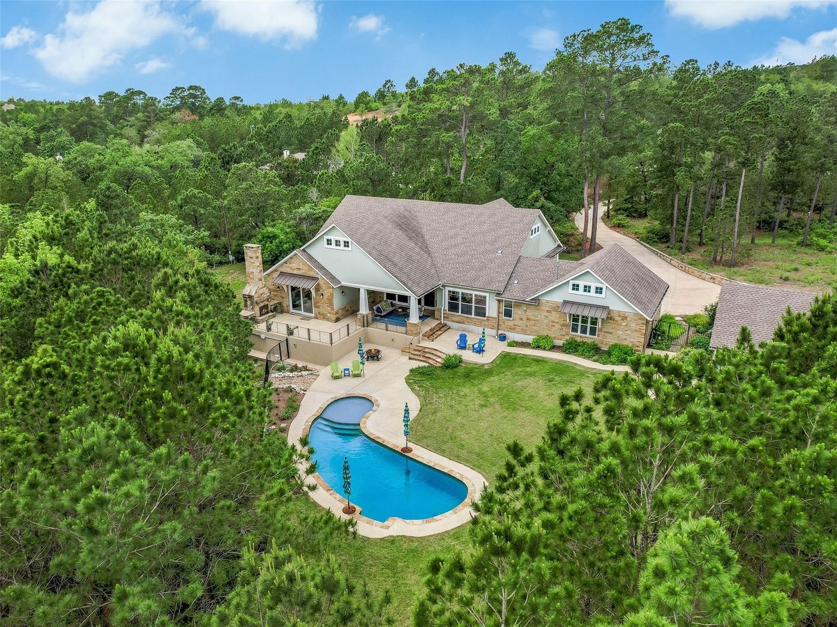 View 271 Tall Forest DR in Pine Forest Unit 9 Ph III 271 Tall Forest DR - front exterior - Luxury home in Pine Forest Unit 9 Ph III, Bastrop, TX
