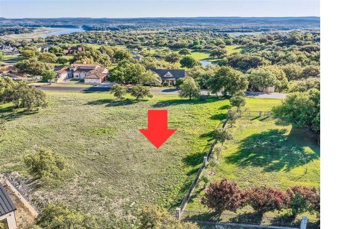 View 27209 Waterfall Hill Pkwy in Barton Creek Lakeside 27209 Waterfall Hill Pkwy - front exterior - Luxury lot in Barton Creek Lakeside, Spicewood, TX