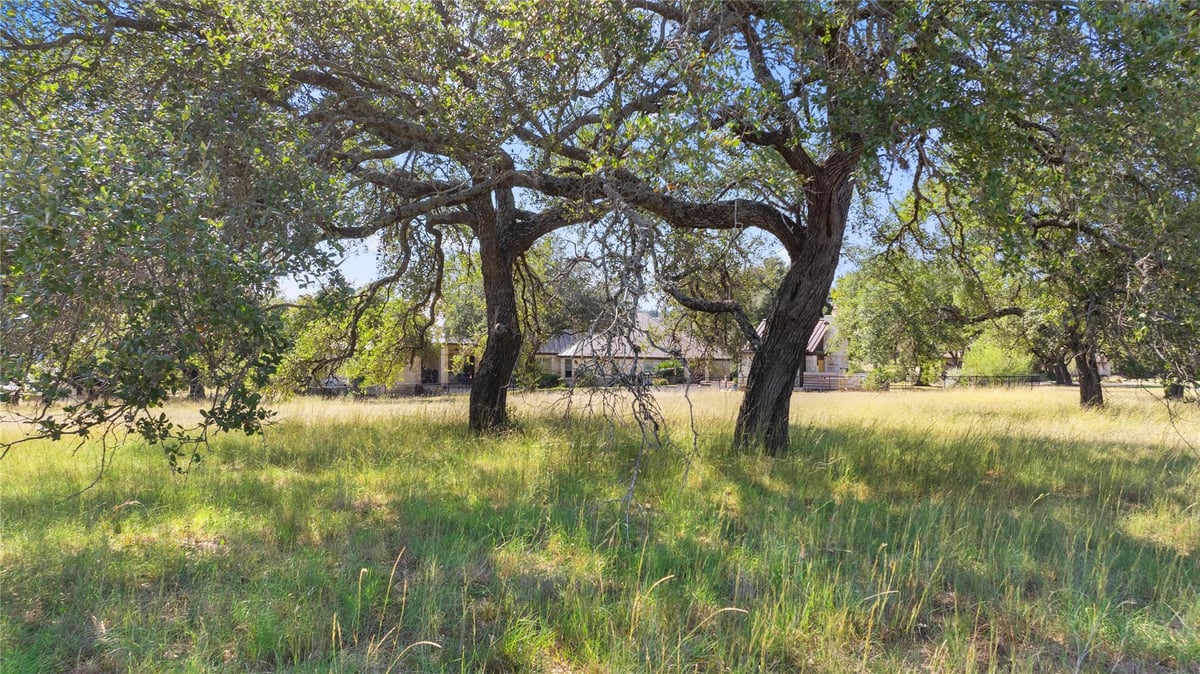 View 27509 Waterfall Hill Pkwy in Barton Creek Lakeside 27509 Waterfall Hill Pkwy - front exterior - Luxury lot in Barton Creek Lakeside, Spicewood, TX