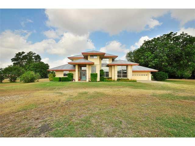 View 2751 County Rd 126 2751 County Rd 126 - front exterior - Luxury home in Georgetown, TX