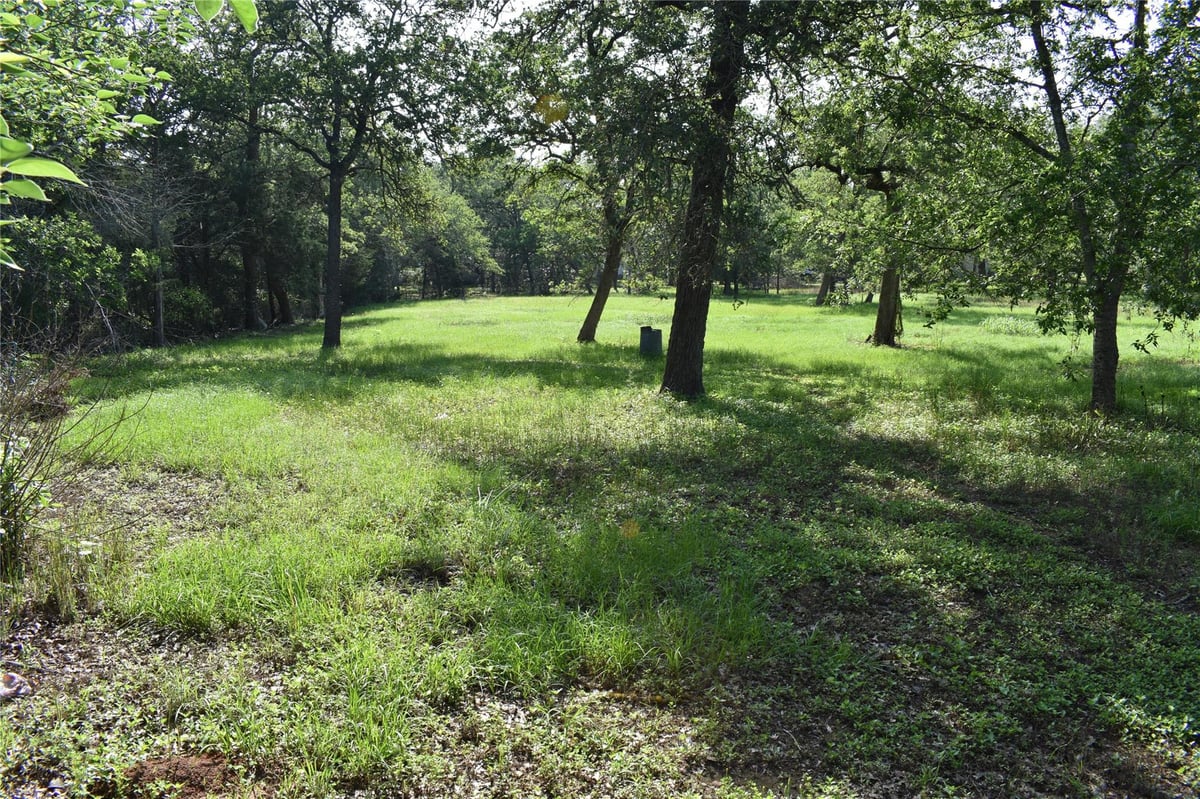 View 276 Arrowhead Dr in Lake Thunderbird 276 Arrowhead Dr - front exterior - Luxury lot in Lake Thunderbird, Smithville, TX