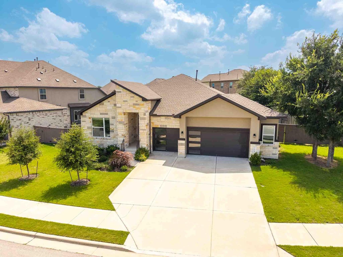 View 276 Washington DR in Anthem 276 Washington DR - front exterior - Luxury home in Anthem, Kyle, TX
