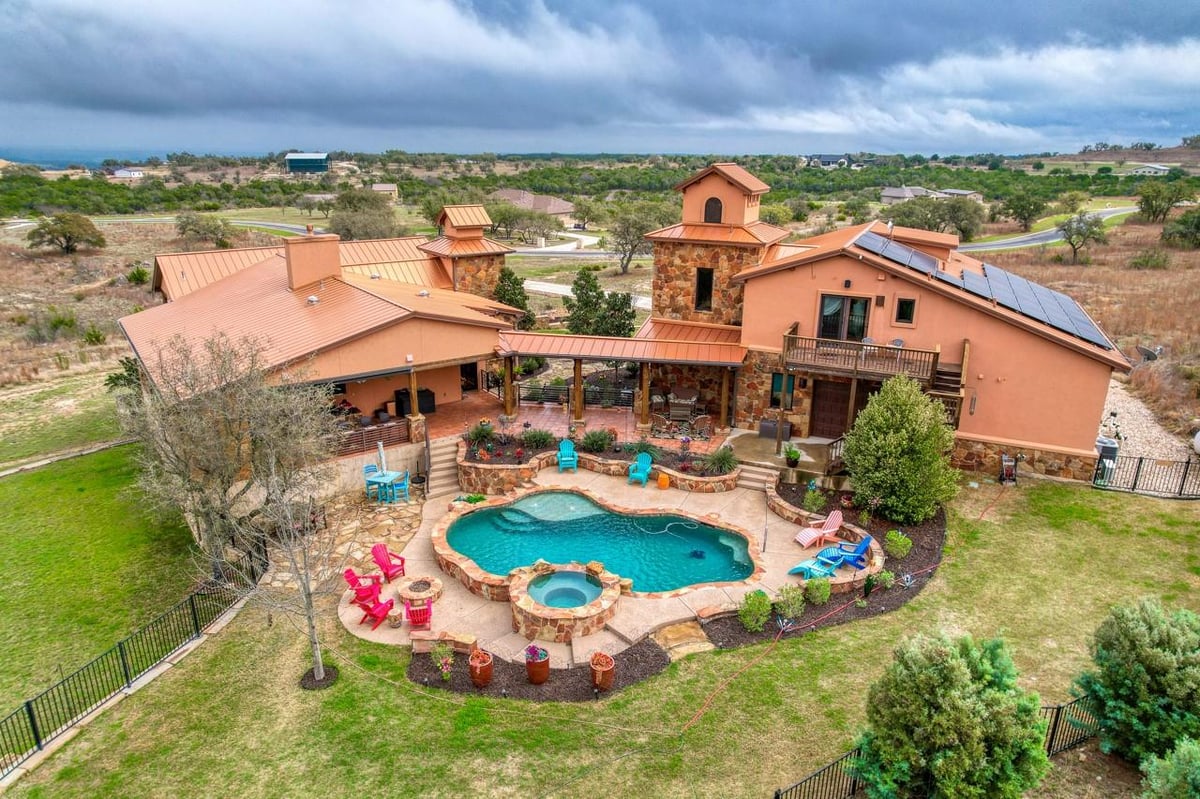 View 281 Cedar Mountain DR in Summit Spgs Ranch 281 Cedar Mountain DR - front exterior - Luxury home in Summit Spgs Ranch, Marble Falls, TX