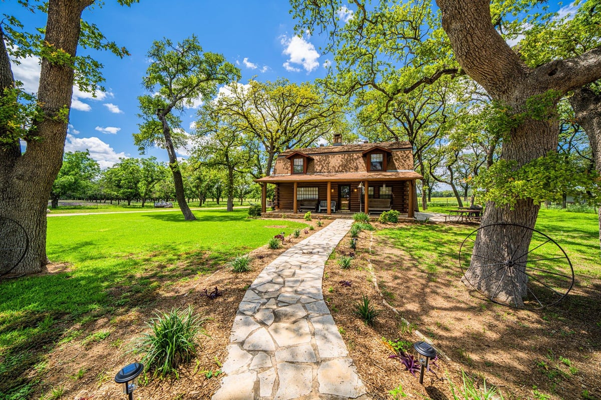 View 283 Hallford in HALLFORD 283 Hallford - front exterior with Fredericksburg ranch house - Luxury home in HALLFORD, Fredericksburg, TX