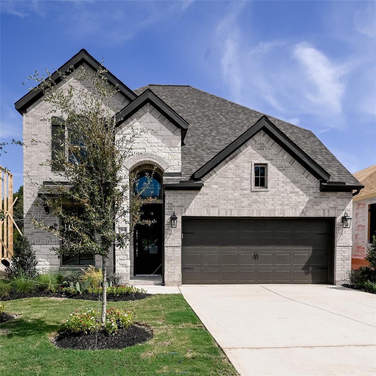 View 284 Basket Flower Loop in 6 CREEKS 284 Basket Flower Loop - property photo 1 - Luxury home in 6 CREEKS, Kyle, TX