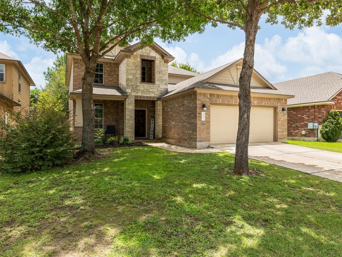 View 289 Serene Hollow LN in Whispering Hollow Ph I Sec 4A 289 Serene Hollow LN - property photo 1 - Luxury home in Whispering Hollow Ph I Sec 4A, Buda, TX