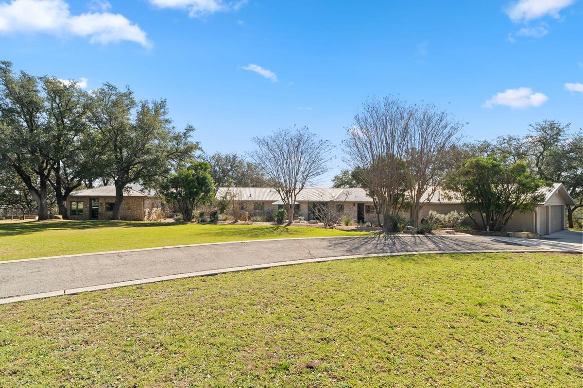 2910  Fall Creek Rd - front exterior - Luxury home in Spicewood, TX