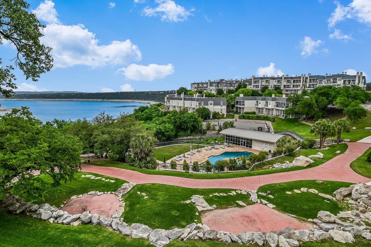 View 2918 N Ranch Road 620 Unit #B112 in Villas On Travis Condo Amd 2918 N Ranch Road 620 Unit #B112 - front exterior - Luxury home in Villas On Travis Condo Amd, Austin, TX