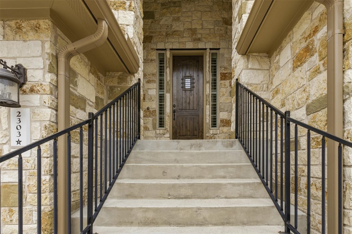 View 2930 Grand Oaks Loop Unit #2303 in Sunset Ridge 2930 Grand Oaks Loop Unit #2303 - front exterior - Luxury home in Sunset Ridge, Cedar Park, TX