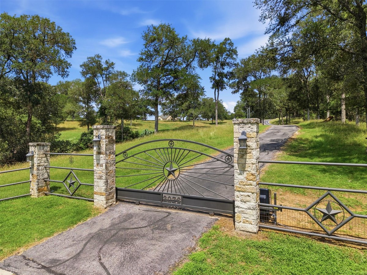 View 2936 FM 1704 in Towering Oaks Estates 02 2936 FM 1704 - front exterior - Luxury home in Towering Oaks Estates 02, Elgin, TX