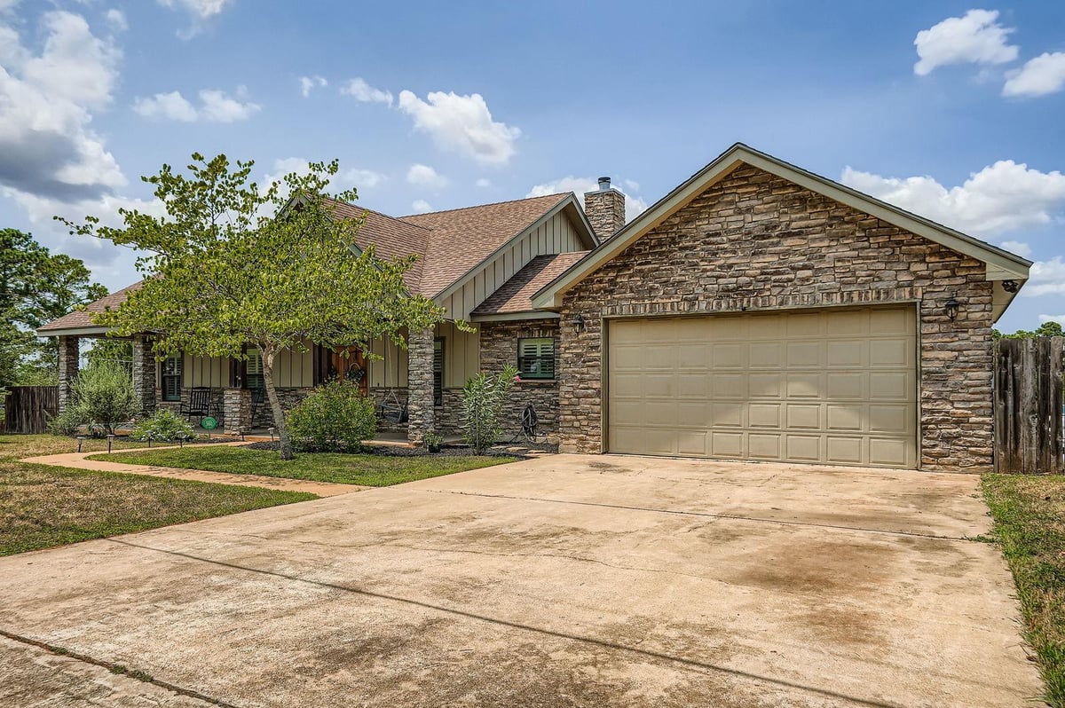 View 296 Makaha Dr in Tahitian Village 296 Makaha Dr - front exterior - Luxury home in Tahitian Village, Bastrop, TX