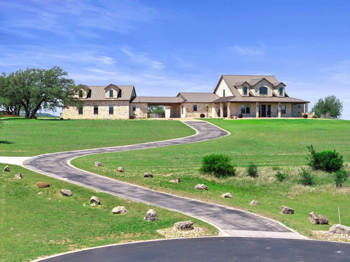 View 297 Kylie Rae Ct in The Vistas At Round Mountain 297 Kylie Rae Ct - front exterior - Luxury home in The Vistas At Round Mountain, Round Mountain, TX