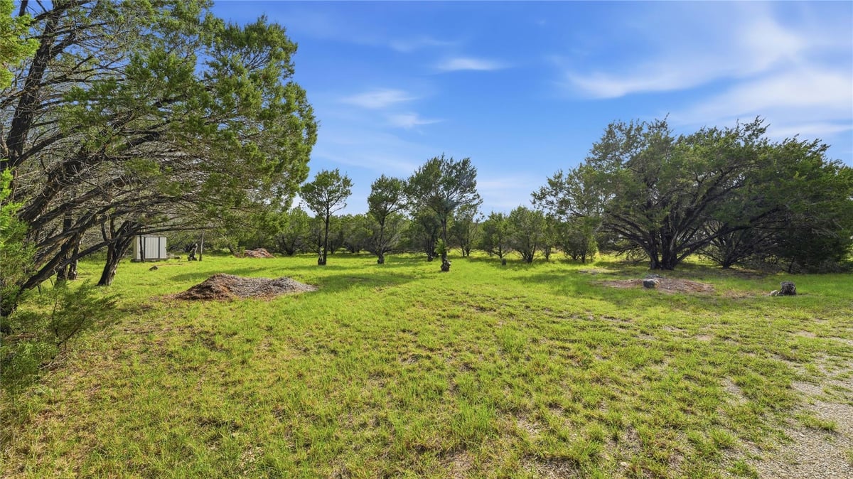 View 30 Meadow Oak CT in Woodcreek Sec 12 30 Meadow Oak CT - front exterior - Luxury lot in Woodcreek Sec 12, Wimberley, TX