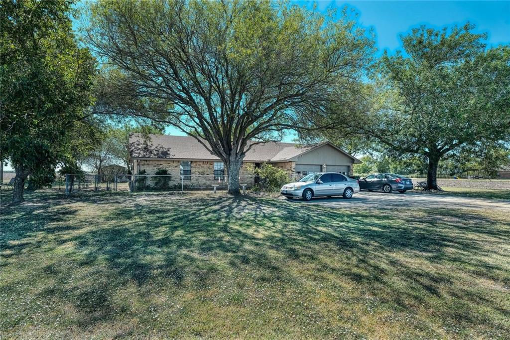View 300 County Road 453 300 County Road 453 - front exterior - Luxury home in Taylor, TX