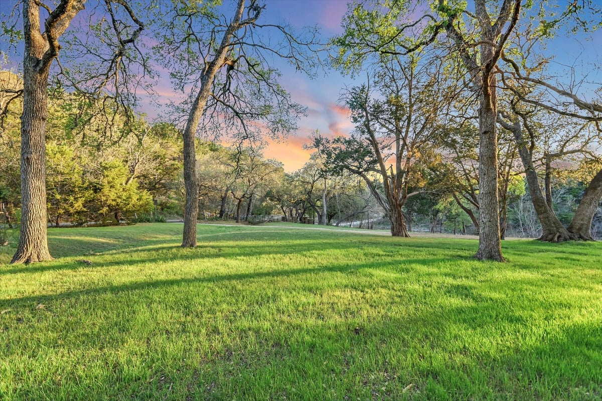 View 300 Deer Lake Estates in DEER LAKE ESTATES 300 Deer Lake Estates - front exterior - Luxury home in DEER LAKE ESTATES, Wimberley, TX
