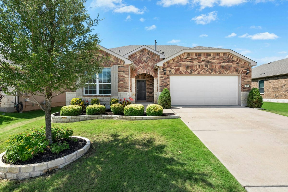 View 300 Hanging Star LN in Sun City Nbrhd 72 300 Hanging Star LN - front exterior - Luxury home in Sun City Nbrhd 72, Georgetown, TX