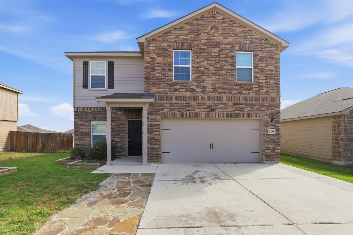 View 300 Hyacinth Way in Sonterra Ii Condos Ph Viii 300 Hyacinth Way - front exterior - Luxury home in Sonterra Ii Condos Ph Viii, Jarrell, TX