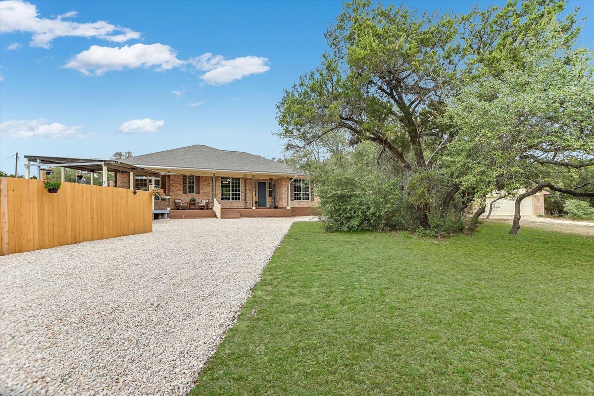 View 300 Round Rock RD in Ledgerock 300 Round Rock RD - property photo 1 - Luxury home in Ledgerock, Wimberley, TX