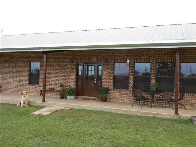 View 3000 County Road 467 3000 County Road 467 - front exterior - Luxury home in Elgin, TX