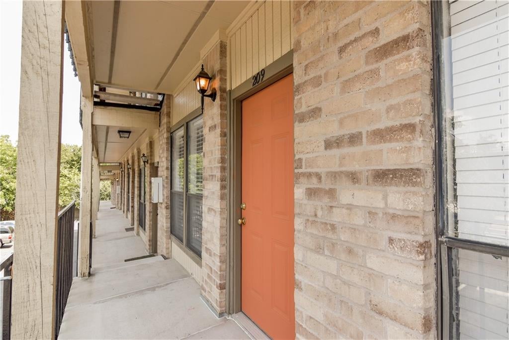 View 3000 Guadalupe St Unit #209 in Three Thousand Guadalupe Place 3000 Guadalupe St Unit #209 - front exterior - Luxury home in Three Thousand Guadalupe Place, Austin, TX