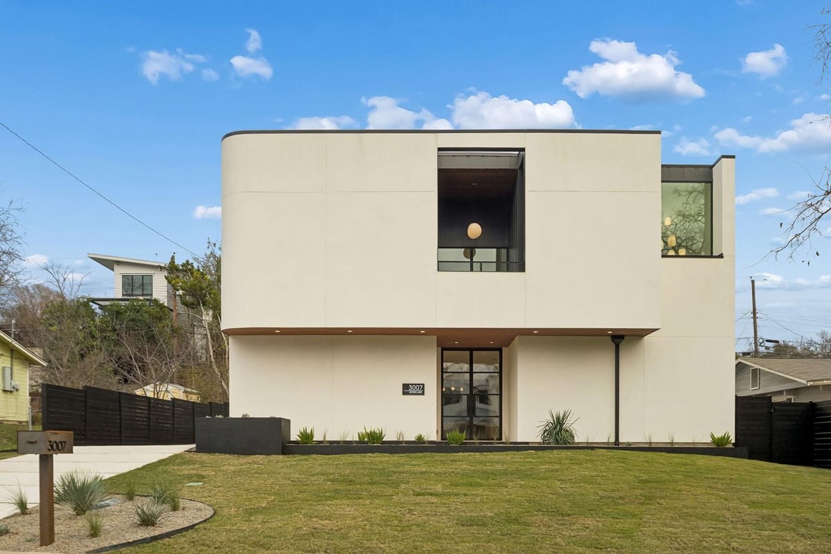 View 3007 Locke Ln in Garden Oaks Sec 02 3007 Locke Ln - front exterior with modern boxy facade - Luxury home in Garden Oaks Sec 02, Austin, TX