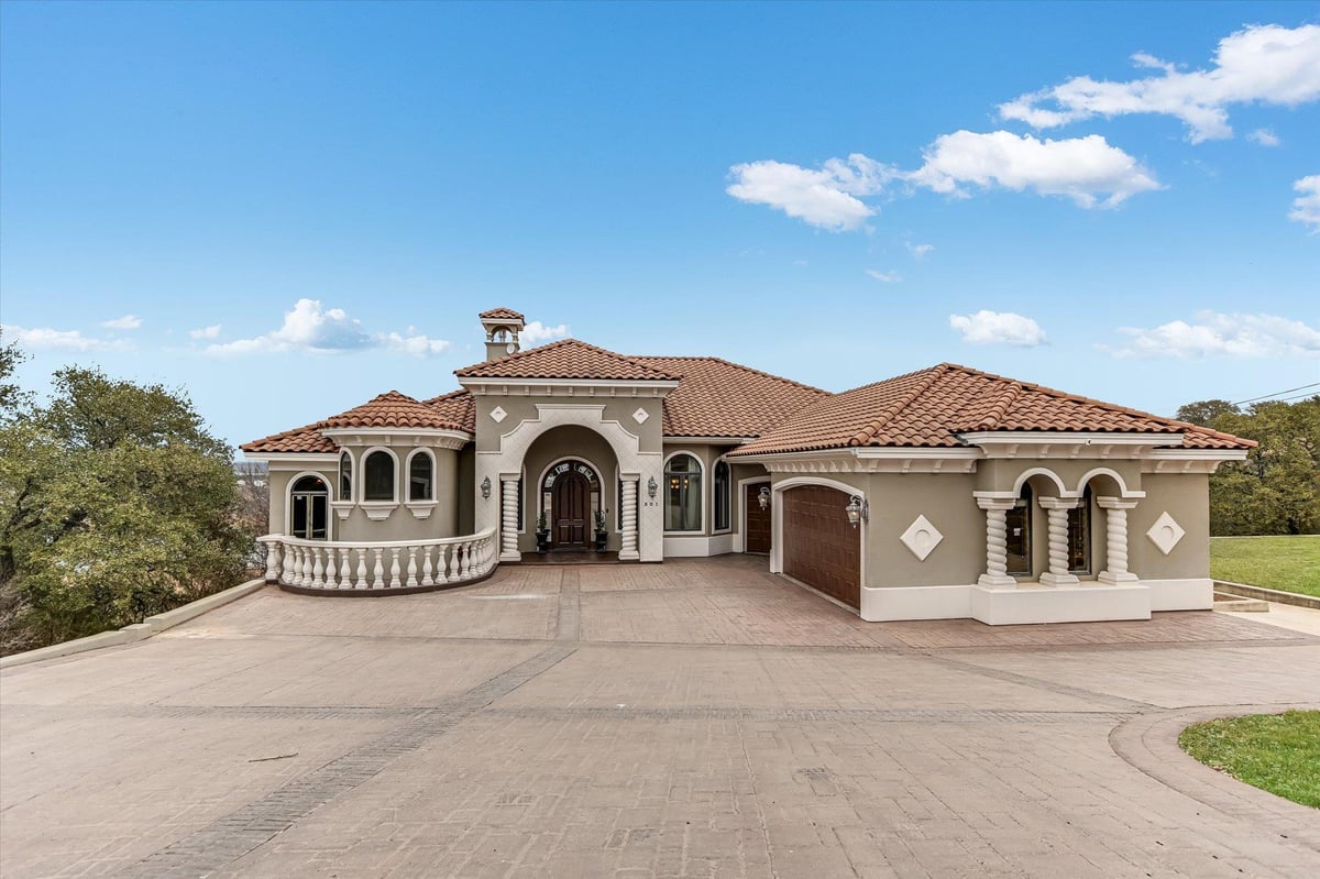 View 301 Circle Dr in Channel Oaks 301 Circle Dr - front exterior - Luxury home in Channel Oaks, Horseshoe Bay, TX