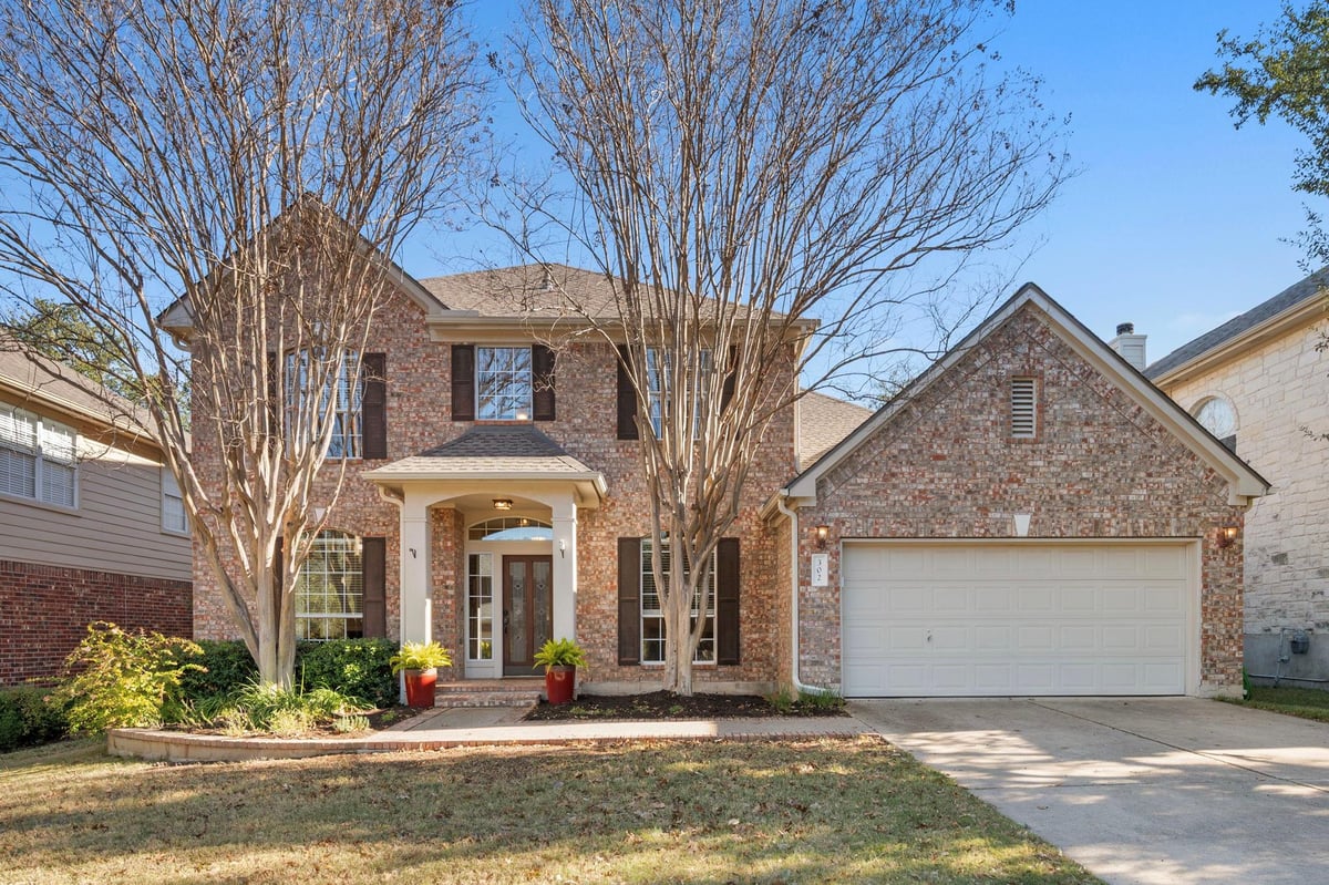 View 302 Kettleman LN in Oak Brook Sec 2A 302 Kettleman LN - front exterior - Luxury home in Oak Brook Sec 2A, Austin, TX