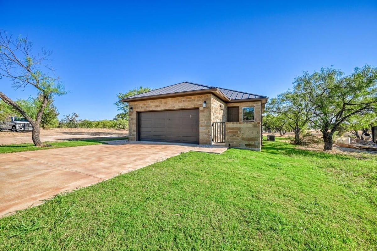 View 302 Parallel CIR in Horseshoe Bay West 302 Parallel CIR - front exterior - Luxury home in Horseshoe Bay West, Horseshoe Bay, TX
