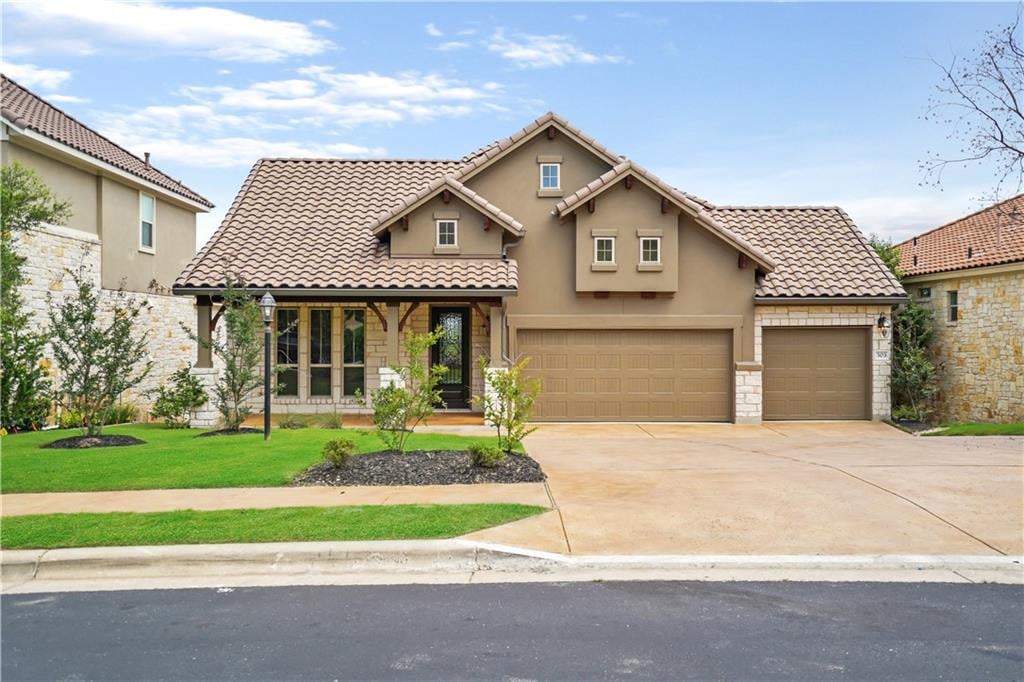 View 303 Aguja CT in Rough Hollow Sec 02 303 Aguja CT - front exterior - Luxury home in Rough Hollow Sec 02, Austin, TX