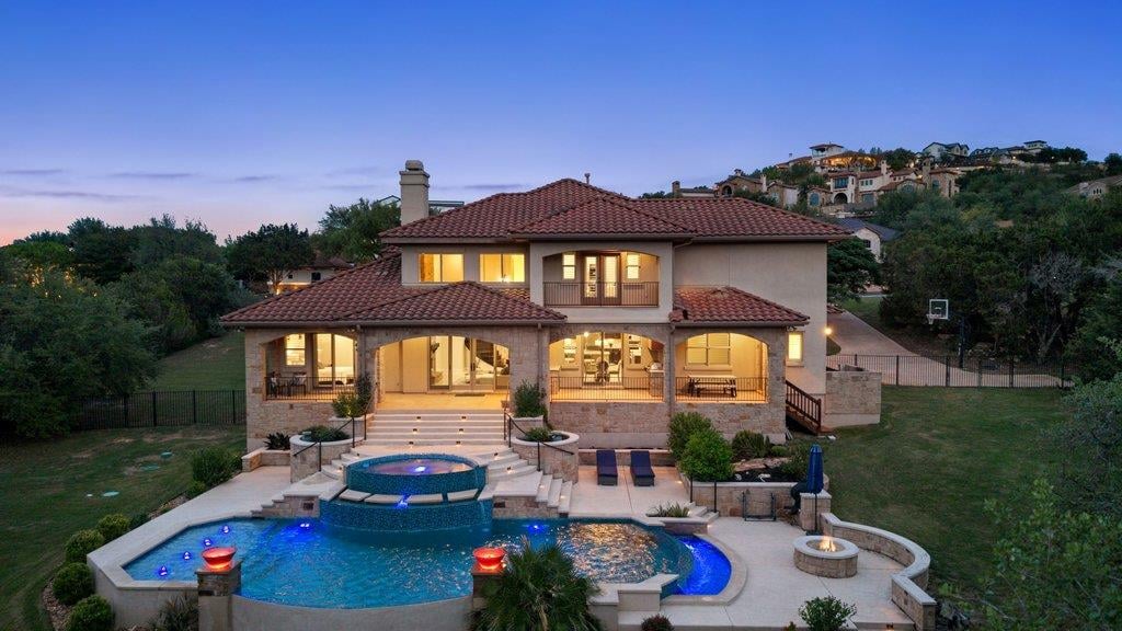 303 Bella Montagna Cir - pool area with twilight pool and spa - Luxury home in BELLA MONTAGNA ESTATES, Austin, TX